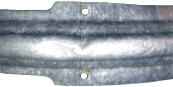 Partie médiane au niveau des échancrures d'aération. Partie médiane au niveau des échancrures d'aération.